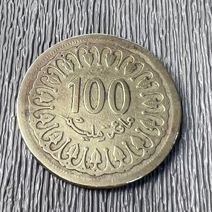 100 millim coin from Tunisia , 1960